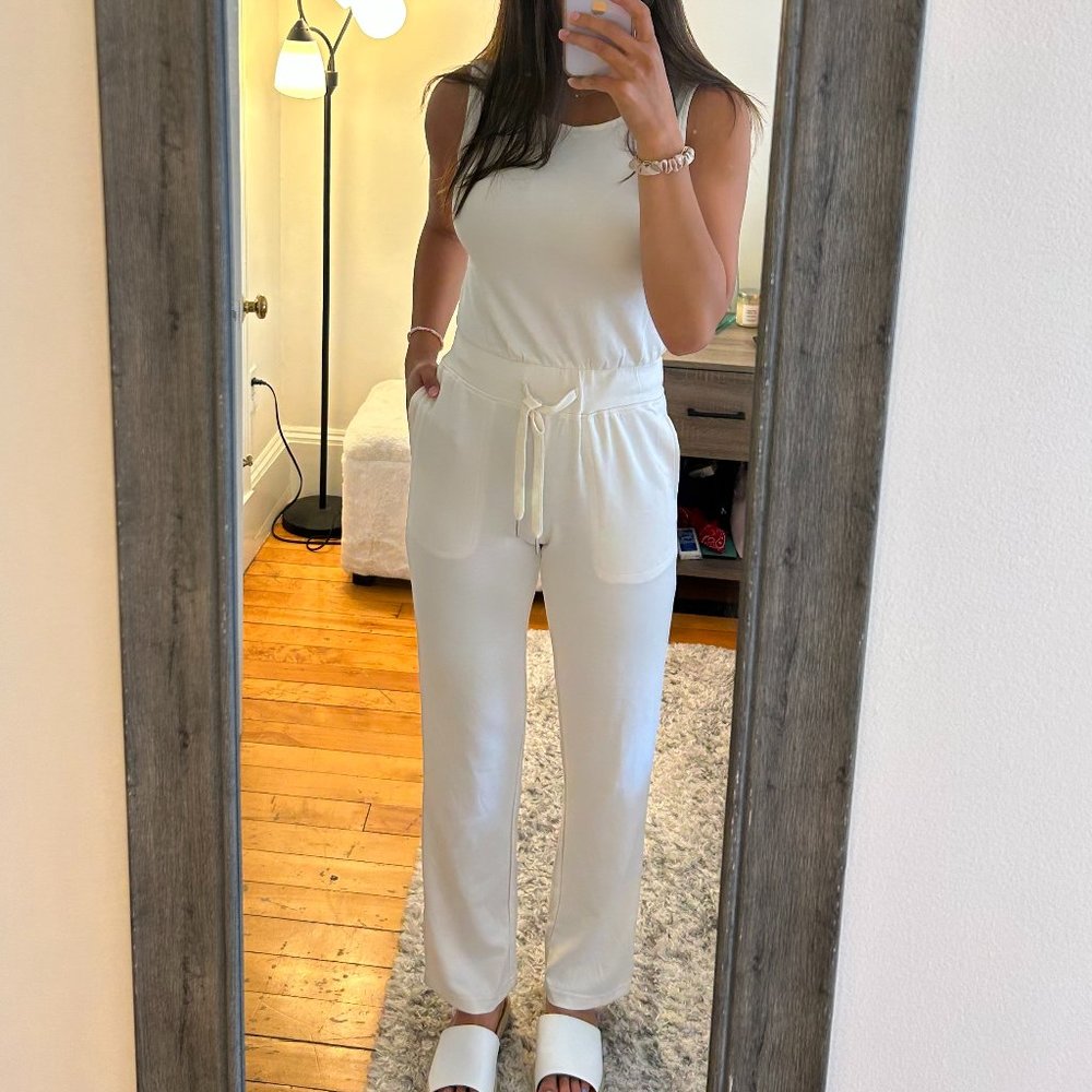 The Air Essentials Jumpsuit, Size XS, brand new.